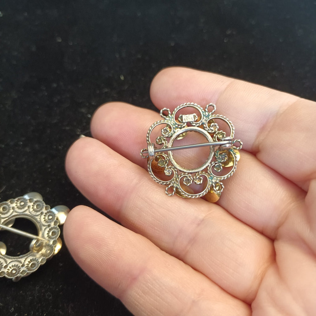 Silver Tone brooches 2.5cm diameter (one marked 830S)