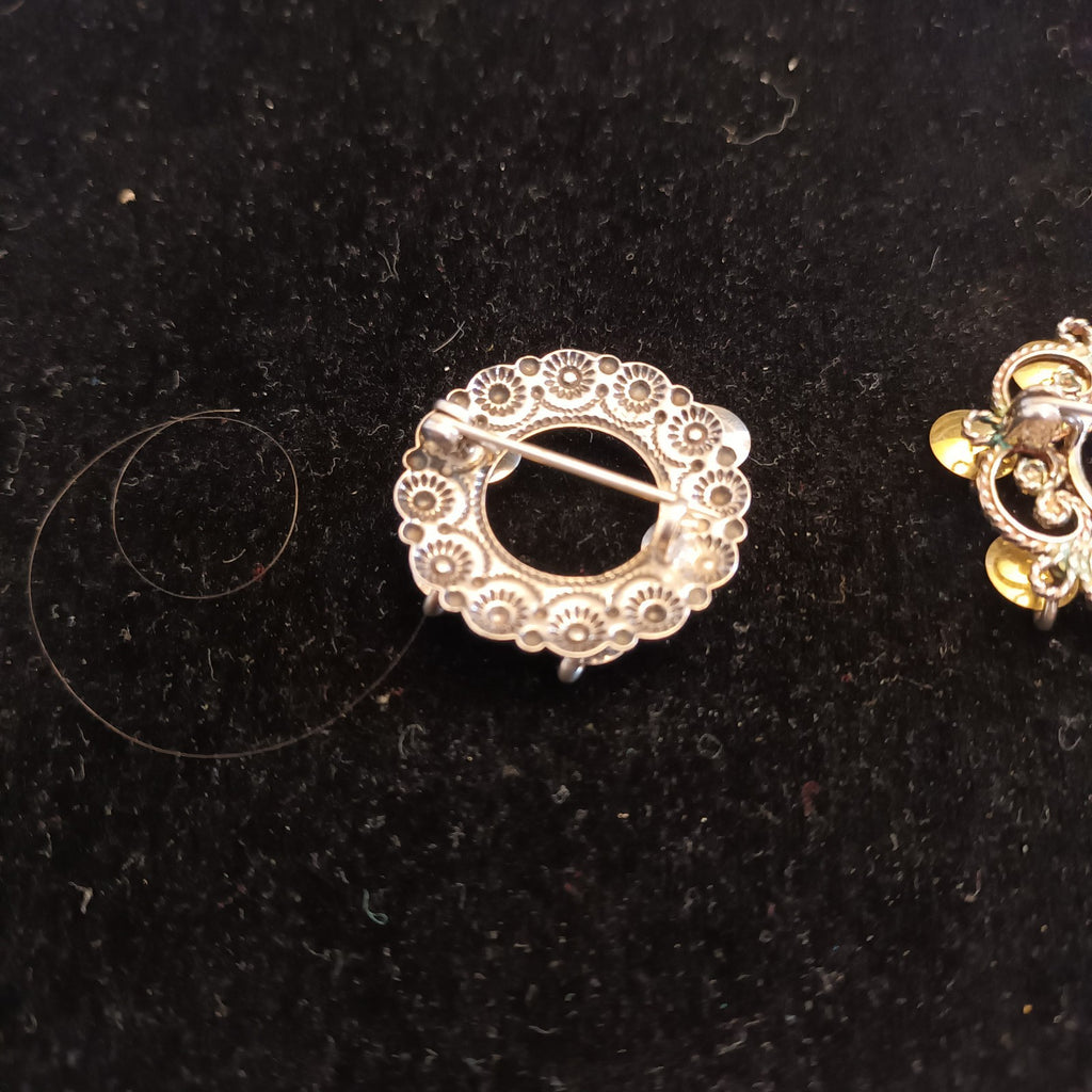 Silver Tone brooches 2.5cm diameter (one marked 830S)