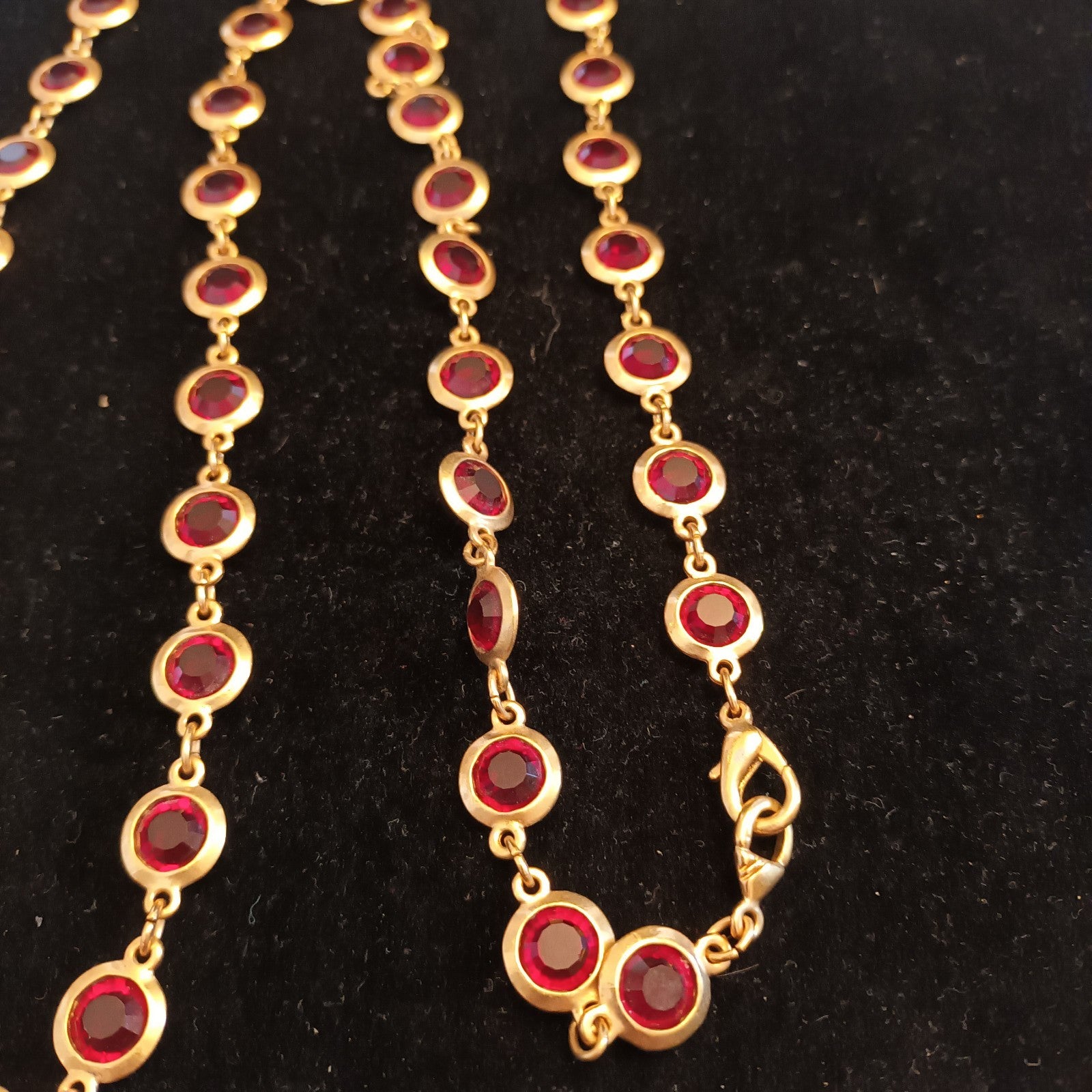 Gold tone bezel set necklace red stones 88cm long
